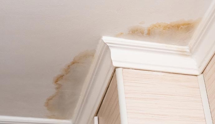 Water stained ceiling and leak damage
