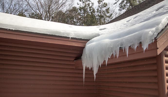 Heavy snow damaged roof
