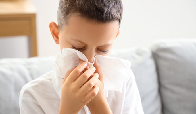 A kid sneezing