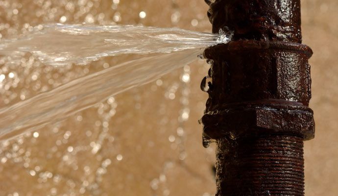 Water leaking from a broken pipe